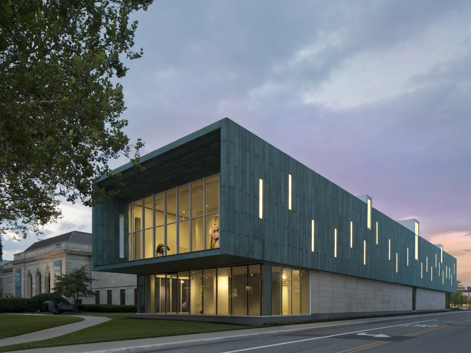 An art building with green copper siding and rectangular shape