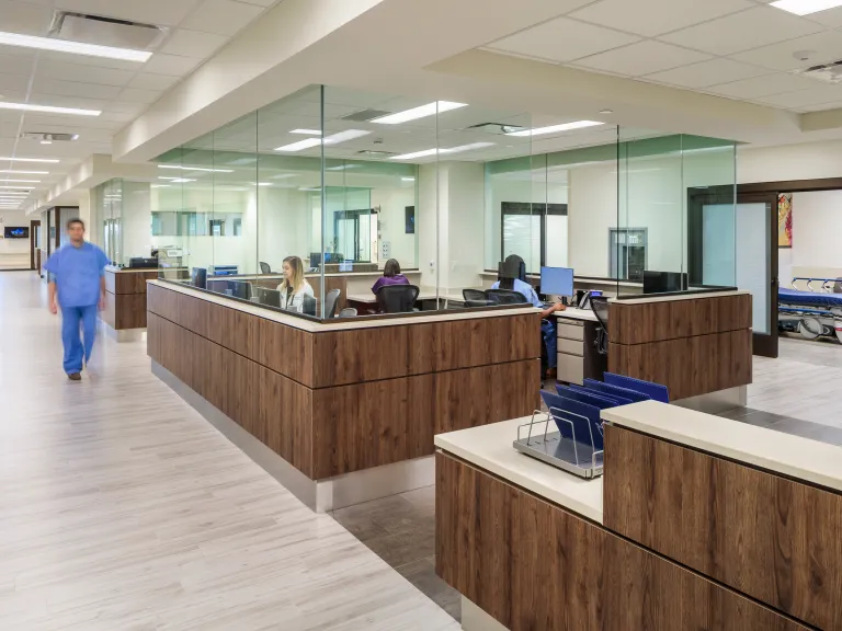 emergency room nurse station with glass and wood space dividers